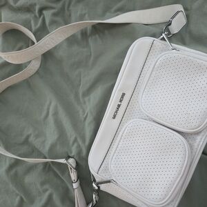 Michael Kors Cream Perforated Crossbody Bag with Dual Front Pockets